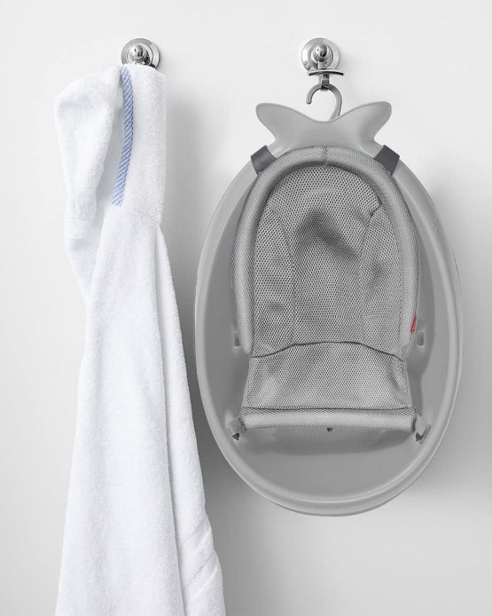 Multi-stage baby bath tub with sling for infant bathing